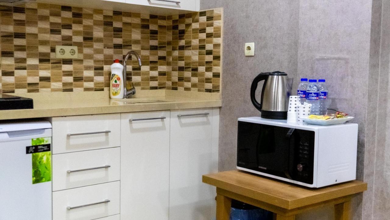 Bursa Suites Apart Otel Ngoại thất bức ảnh A microwave oven in a kitchen