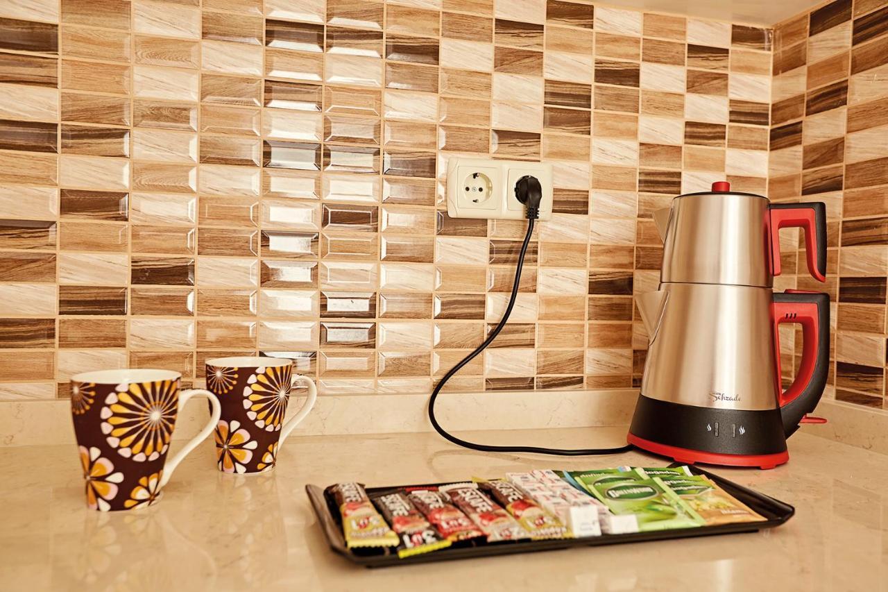 Bursa Suites Apart Otel Ngoại thất bức ảnh A kettle plugged into a wall socket
